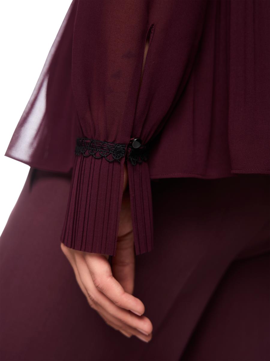 Damen Plisseebluse mit femininen Details